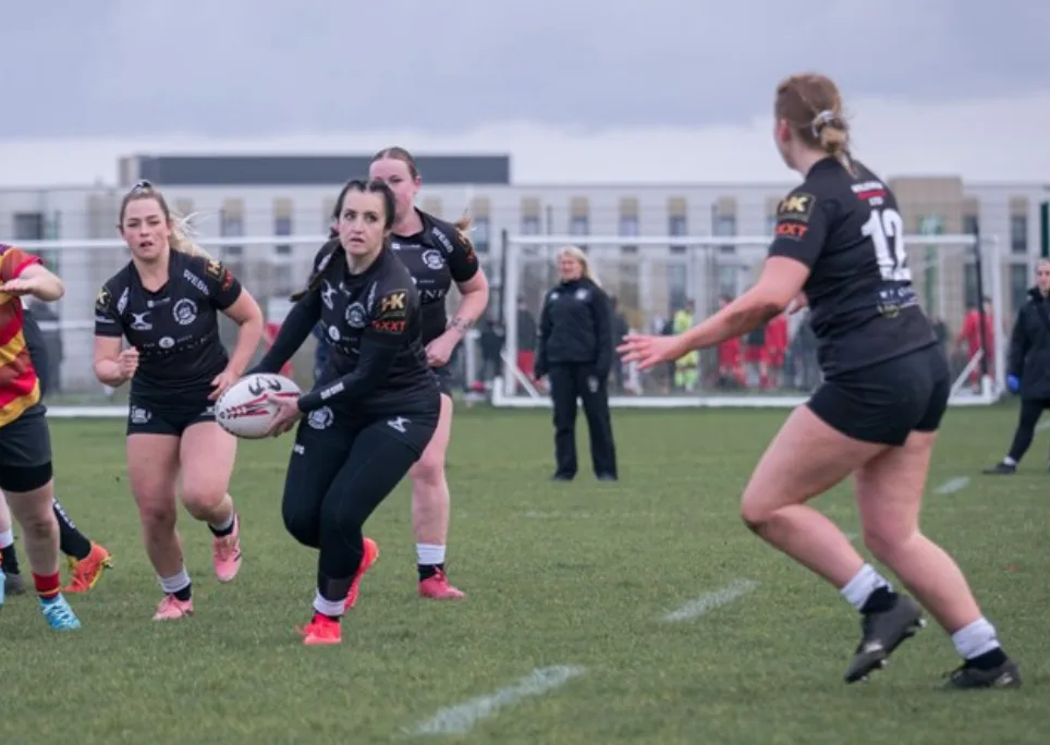 Royal Wootton Bassett women's rugby players in HK Engineering sponsored shirts